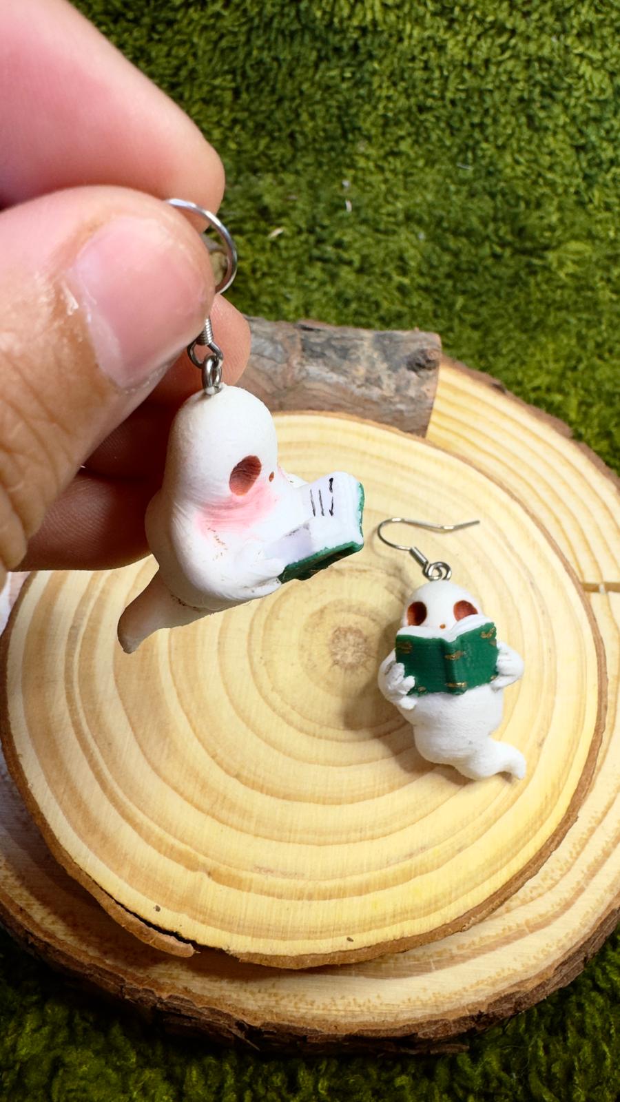 Pendientes fantasmas lectores libro verde image 1