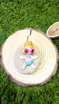 Broche niña playa