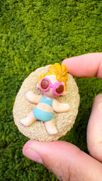 Broche niña playa