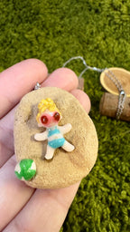 Colgante niña playa