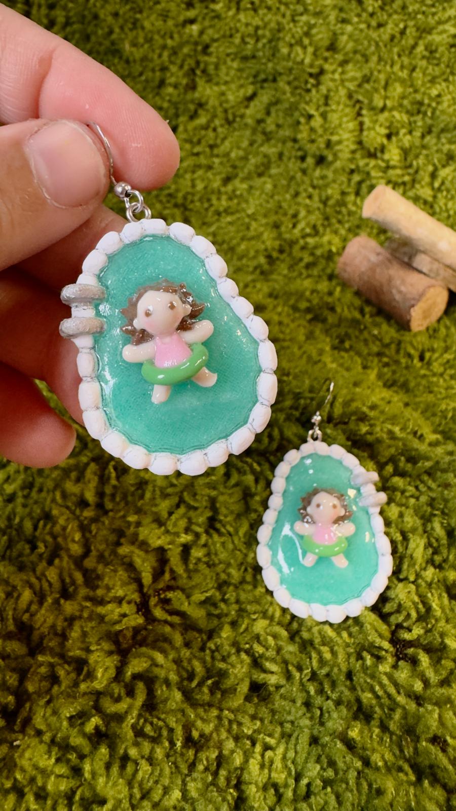 Pendientes niñas piscina