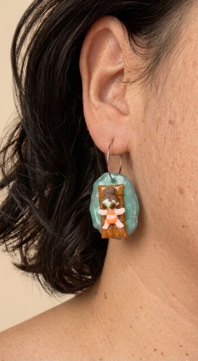 Pendientes niñas en el agua