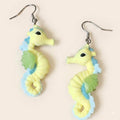 Pendientes caballito de mar amarillo